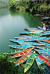 Scenery of colorful tour boats at a lake