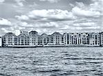 Docks in London Docklands on River Thames, UK - high dynamic range HDR - black and white