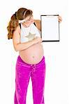 Pregnant woman holding blank clipboard isolated on white