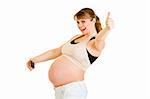 Laughing pregnant woman photographing her belly and showing thumbs up gesture isolated on white