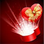 Red heart shape gift with light from inside