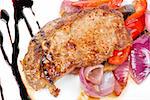 Roasted beef steak with vegetable closeup at plate