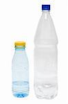 Two plastic bottles with water on white background