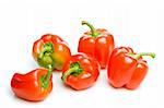 group fo red bell peppers on white background