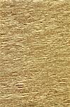 Golden crumpled paper texture for background