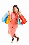 Excited african-american woman, holding shopping bags.  Full body isolated on white.