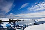 yacht sailing among the glaciers in Antarctica