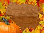 Autumn background with colored leaves on wooden board. EPS 8 vector file included