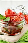 Italian sun dried tomatoes in olive oil, glass jar