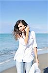 happy young woman relax on beautiful  beach at morning