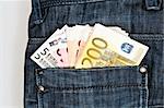 Euro banknotes in jeans back pocket