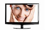 Modern lcd TV showing a beautiful young woman smiling.