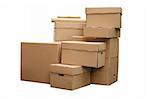 Brown different cardboard boxes arranged in stack on white background