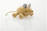 wooden mouse painted on white background