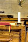 Detail of hymnal and candle