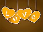 Hanging hearts with love signature.