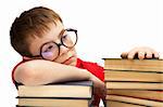 boy with glasses and books on white background