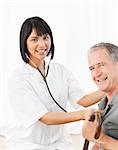 Nurse with her patient looking at the camera