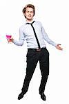 Young man holding a glass of pink wine. Studio photo of blonde man on white background.