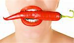 red chilli pepper at woman mouth on a white