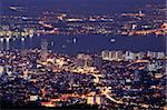 Cityscape of colorful night scene with river in Penang, Malaysia, Asia.