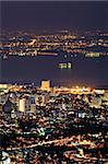 City night with golden buildings in Penang, Malaysia, Asia.