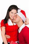 young couple in love dressed in red christmas clothes