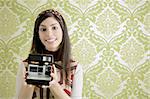 Retro photo camera shooting woman green sixties wallpaper vintage
