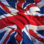 Flag of the United Kingdom, fluttering in the breeze, backlit rising sun. Sewn from pieces of cloth, a very realistic detailed state flag with the texture of fabric fluttering in the breeze, backlit by the rising sun light