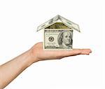 Hand and money house isolated on white background