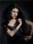 Beautiful woman with long black healthy hair in arabic traditional clothes