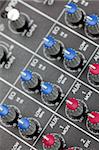 Closeup of audio mixing console. Shallow depth of field