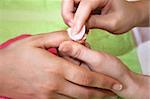 Hands during the manicure work.