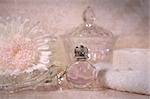 Vintage perfume bottle with flower and soap