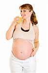 Happy beautiful pregnant woman drinking orange juice isolated on white