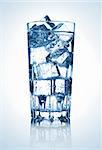 full glass of fresh cool transparent water with ice