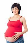 Smiling pregnant woman isolated over white background
