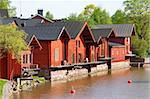 Picturesque wooden houses and the river in the town of Porvoo, Finland.