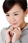 Attractive beautiful Asian woman with pleasure, closeup portrait.