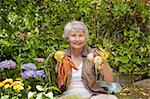 Retired woman working in the garden