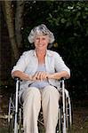 Smiling woman in her wheelchair