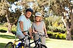 Elderly couple with their bikes
