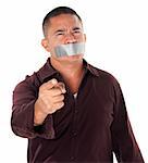 Angry Hispanic man with duct tape over his mouth and pointing finger on white background