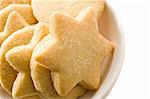 Star shaped homemade cookies in a white plate