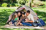 Joyful family camping