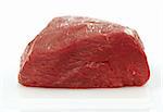 fresh raw meat on white cutting board