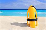 Baywatch rescue buoy yellow on tropical beach Caribbean sea
