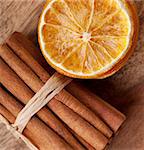 Slices of dried Orange with cinnamon sticks