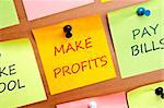 Make profits post it on wooden wall