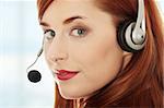 Young businesswoman with headset.